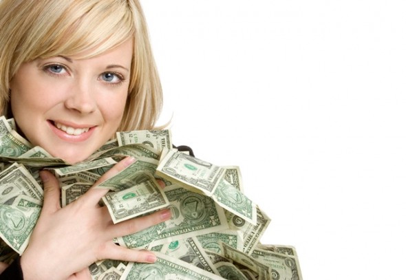 wealthy woman holding cash