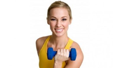 Woman exercising and smiling