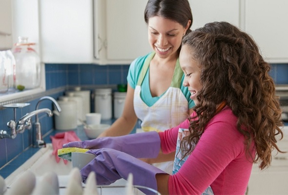 mother and daughter washing dishes